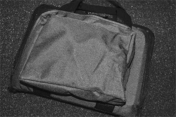 A bag that is laying on the ground.