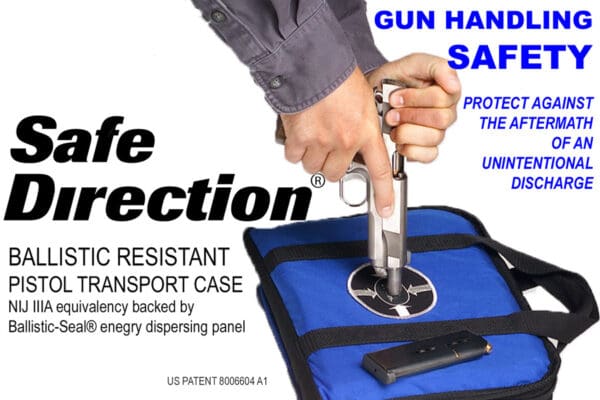 A man is holding onto the handle of a gun.